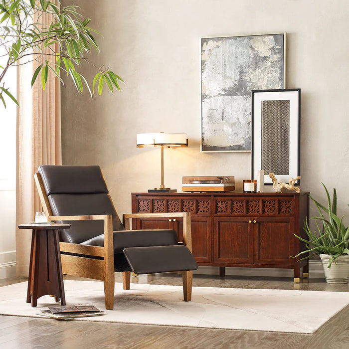 A photo of a room with a Brown Leather Recliner, a stand, and other furniture in the background.